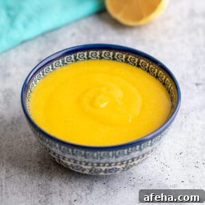A bowl filled with lemon curd.