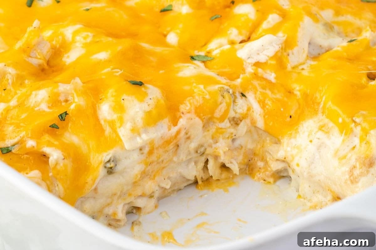 Cheesy chicken casserole with layers of creamy filling and tender chicken.