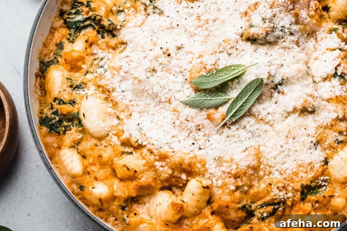 Baked gnocchi with pumpkin, kale, and melted cheese.
