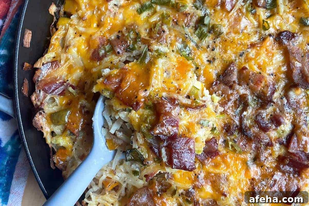 A skillet of hash brown breakfast casserole - zoomed in.