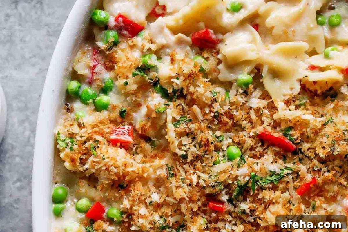 Creamy tuna noodle casserole topped with a golden breadcrumb crust.