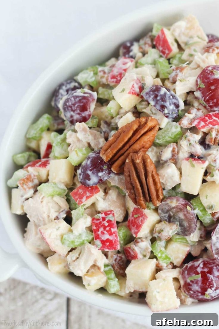 Overhead closeup of chicken salad in white serving bowl
