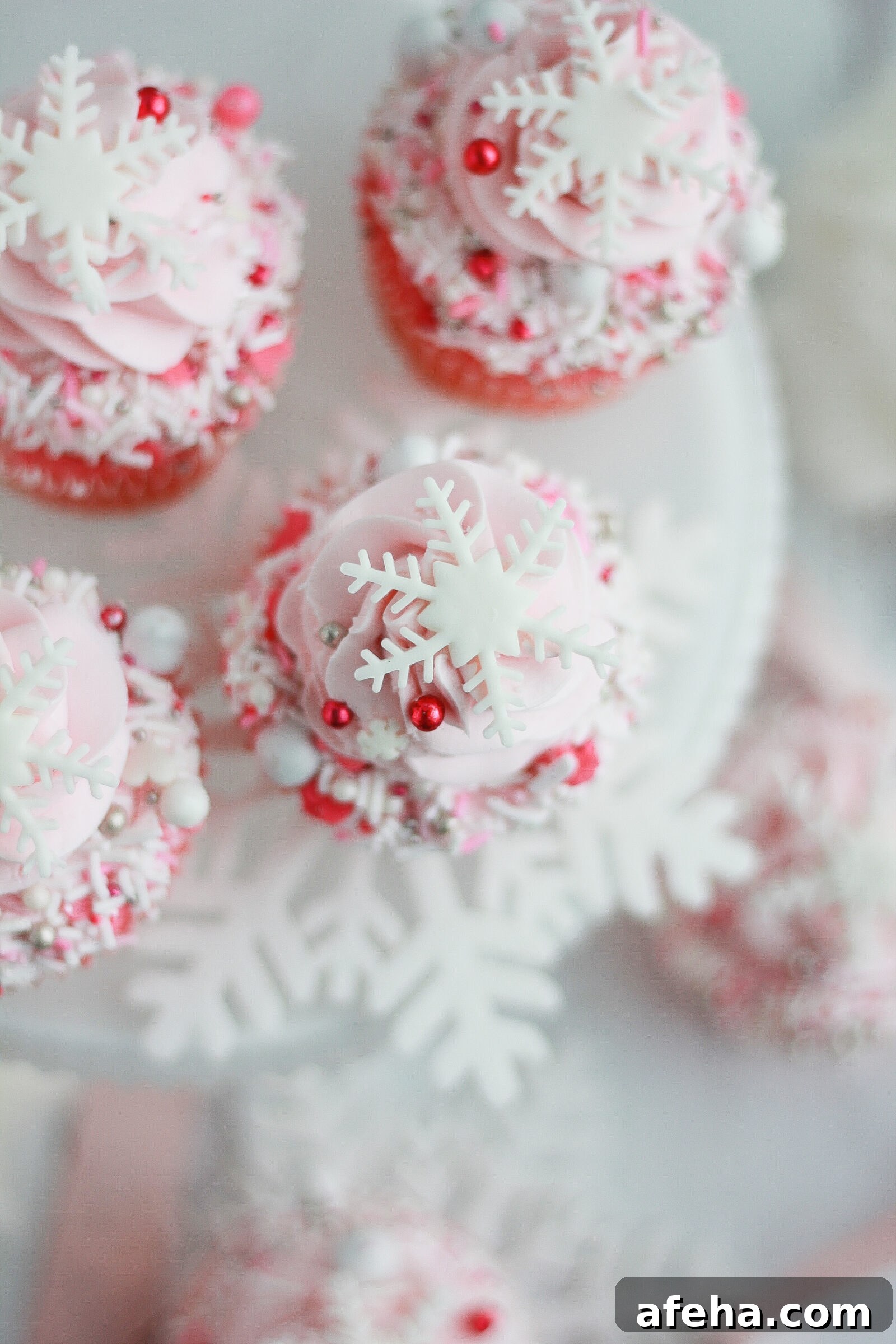Pink Winter Wonderland Cupcakes: Festive Whipped Frosting Recipe 4 Pink buttercream piped on cupcakes
