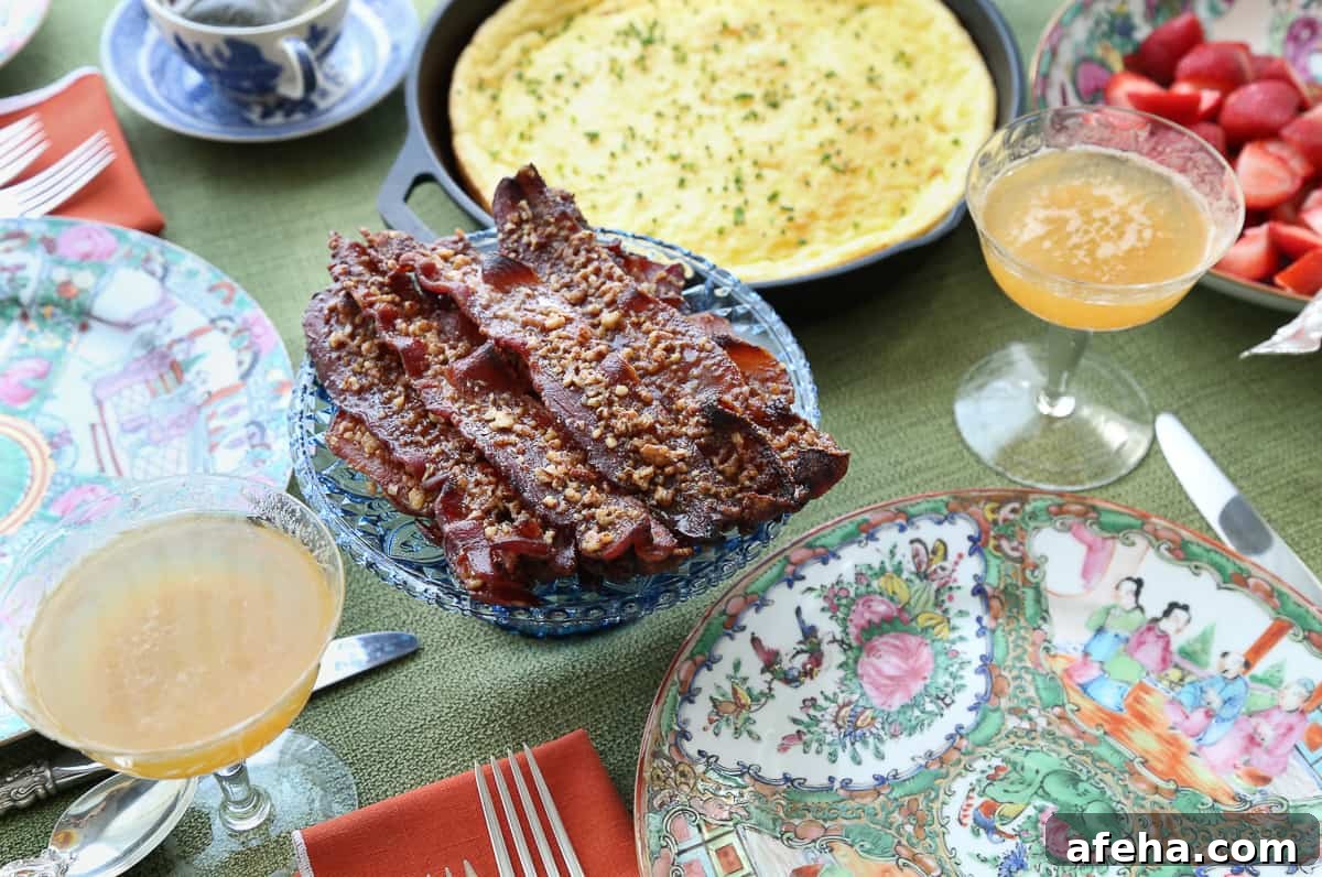Praline-Crusted Candied Bacon — Sweet & Crunchy Bacon Recipe 3 table set for brunch with praline candied bacon and spoon bread.