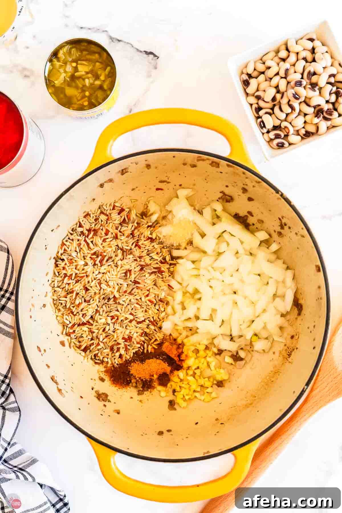 rice and onion cooking in a pot