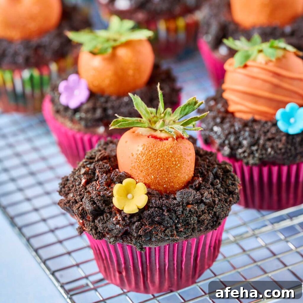 Chocolate carrot patch cupcakes for easter set on a rack