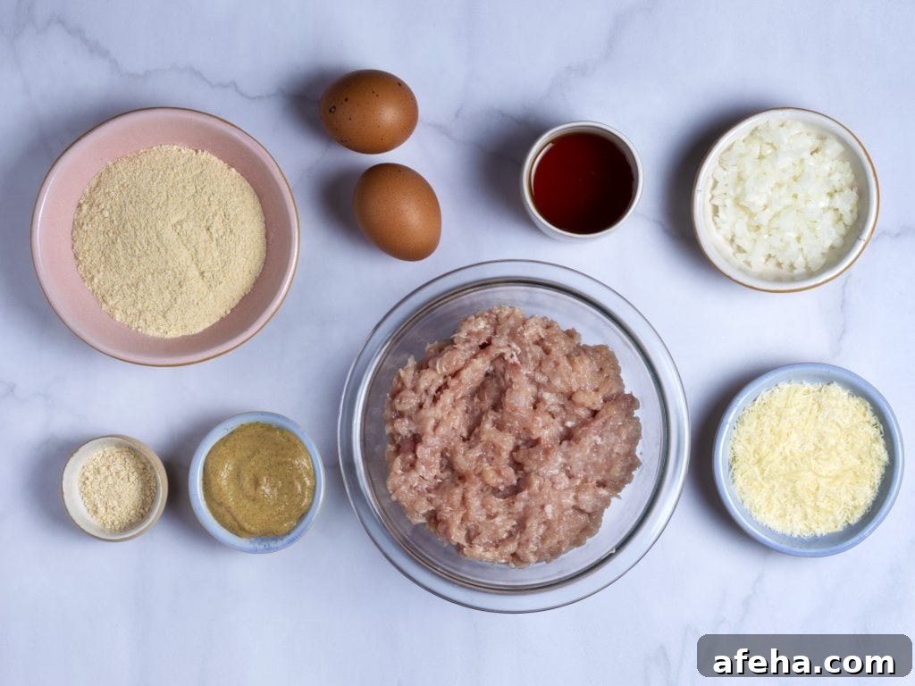 ingredients for easy chicken meatloaf: ground chicken, eggs, parmesan, breadcrumbs, salt and pepper