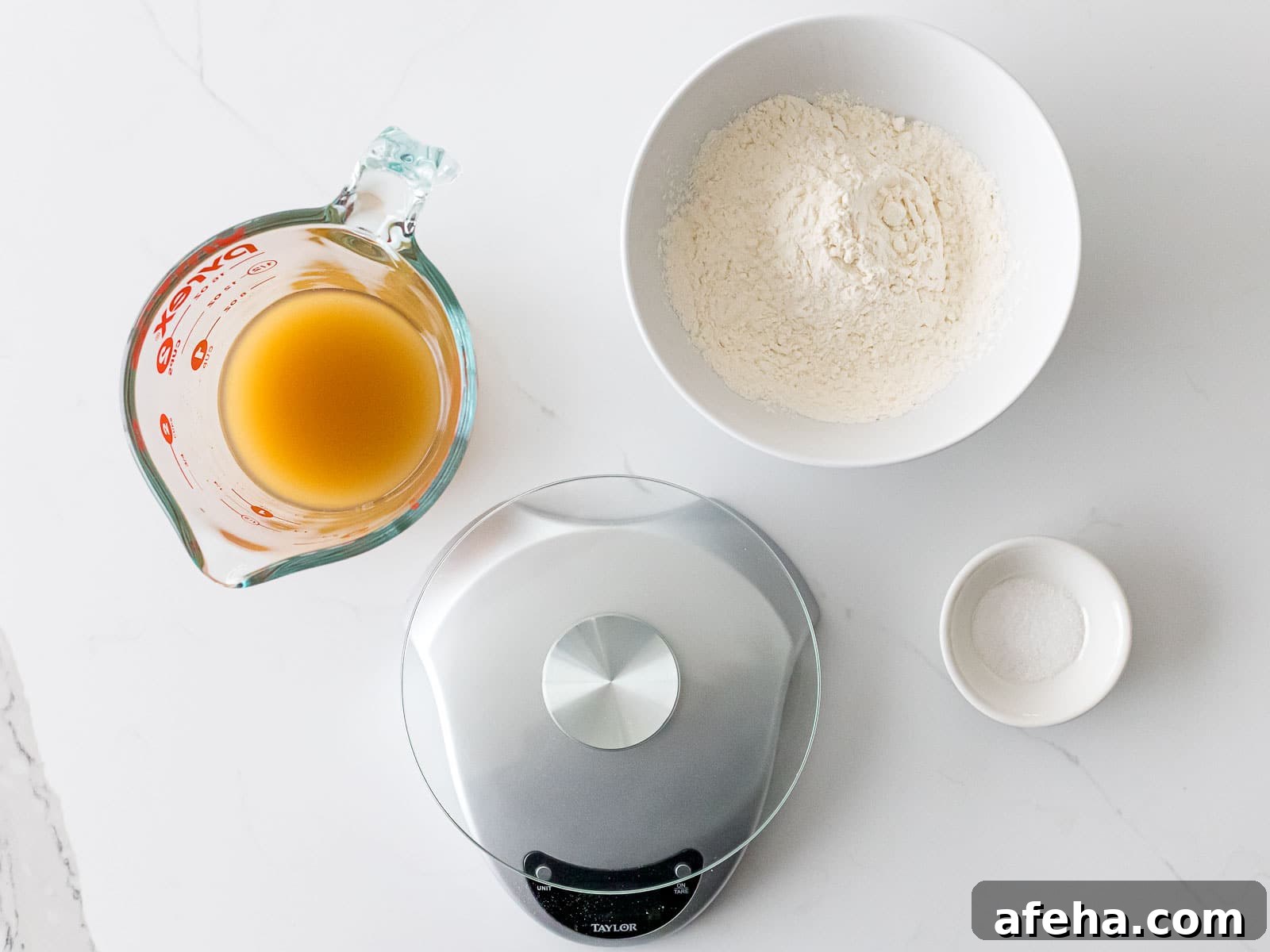 ingredients for yeast water starter including flour, kitchen scale, and salt