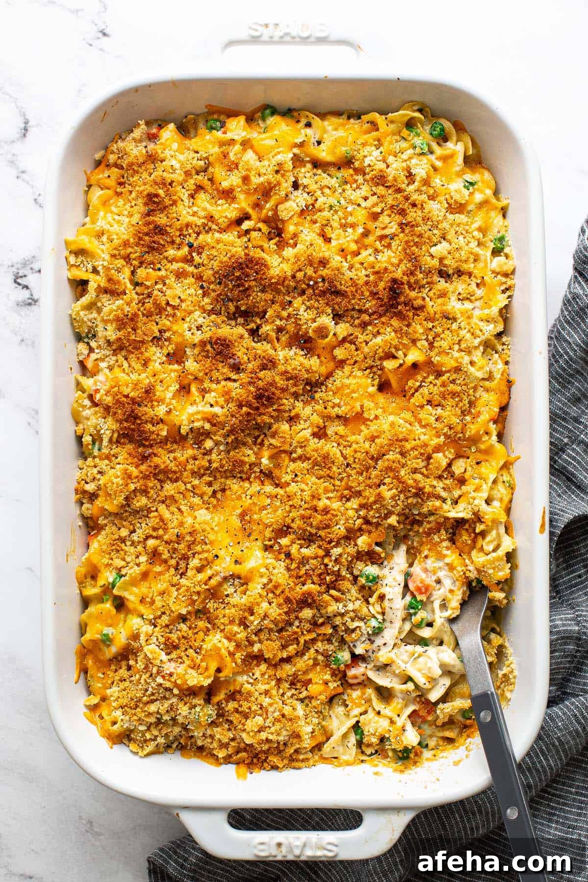 Comforting Chicken Noodle Soup Casserole Recipe 8 Freshly baked chicken noodle casserole in a large baking dish.