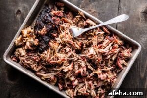 Smoked Pork Shoulder - pulled pork on sheet pan horizontal