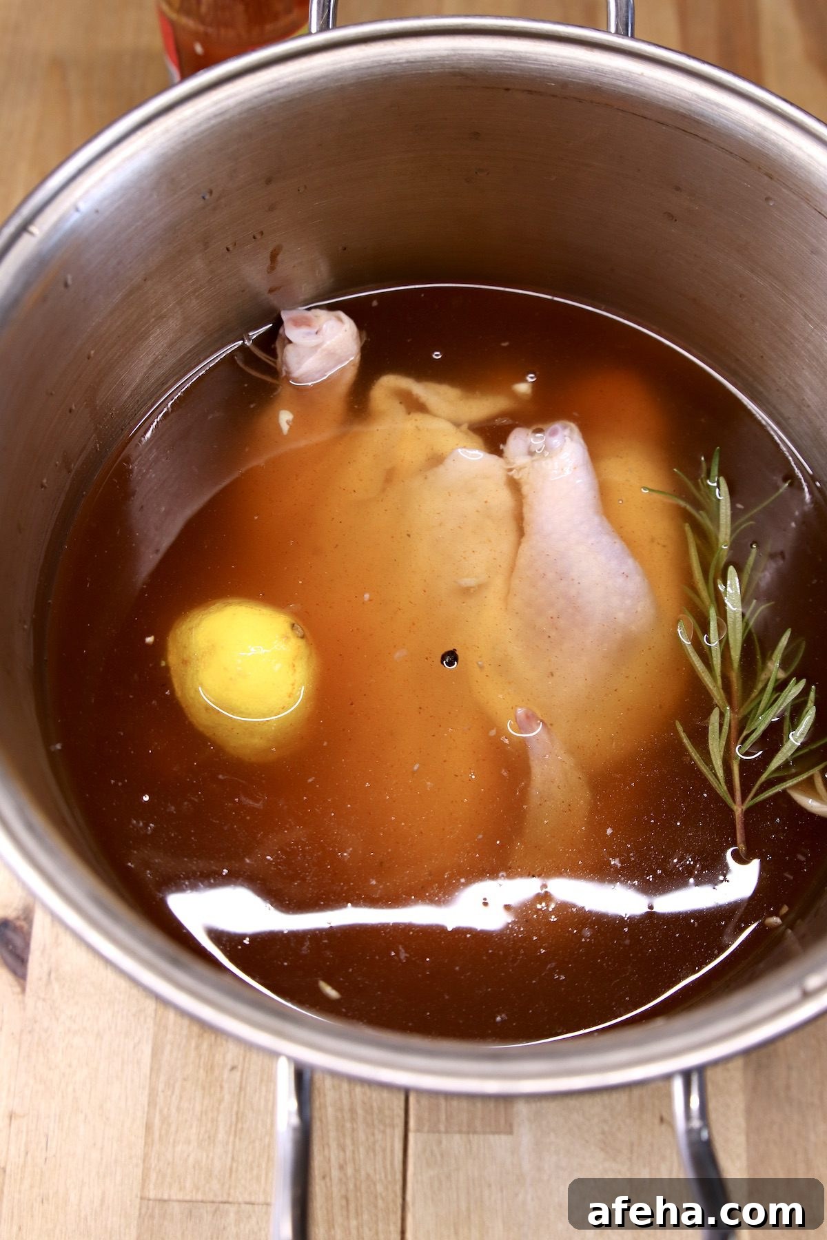 Brining whole chicken with hot sauce, lemon, garlic and rosemary