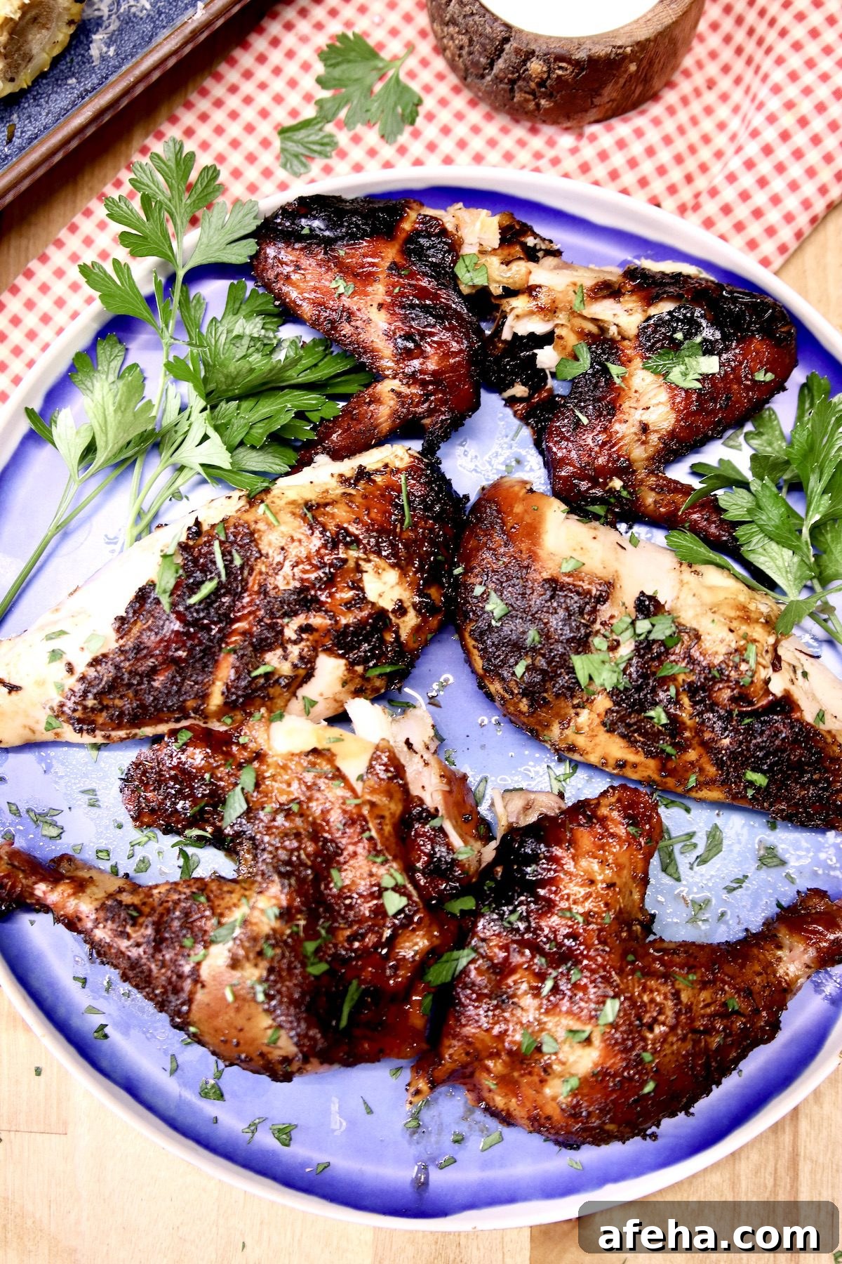 platter of chicken, grilled and cut up into pieces
