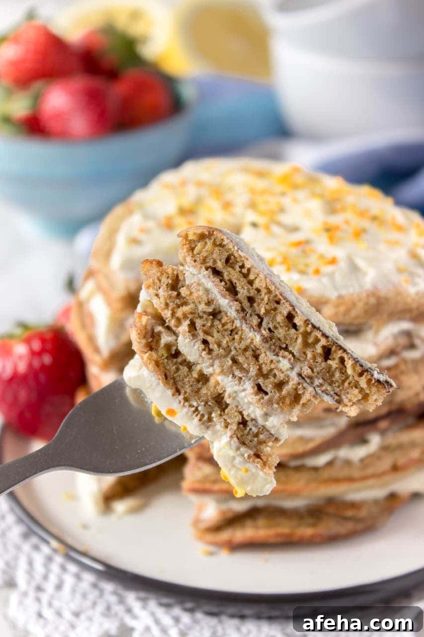 Whole grain healthy Lemon Cardamom Pancakes with cream cheese filling and strawberries