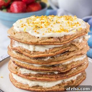 Whole grain healthy Lemon Cardamom Pancakes with cream cheese filling and strawberries