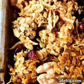 Homemade granola on a baking sheet.
