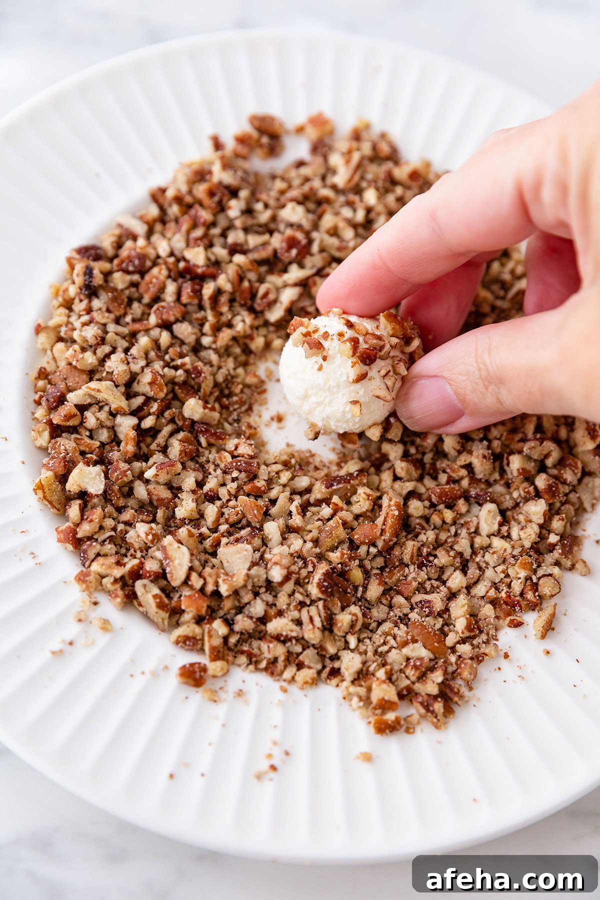 Festive Christmas Cheese Ball Wreath Recipe & Party Appetizer Tips 5 Rolling Mini Cheese Balls in Chopped Nuts