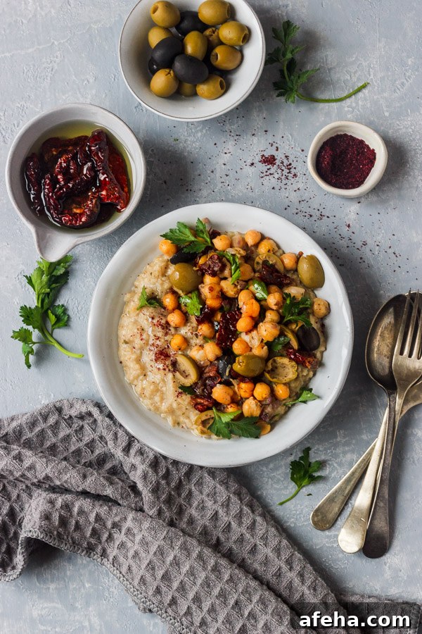 savory oats topped with chickpeas, sundried tomatoes and olives.
