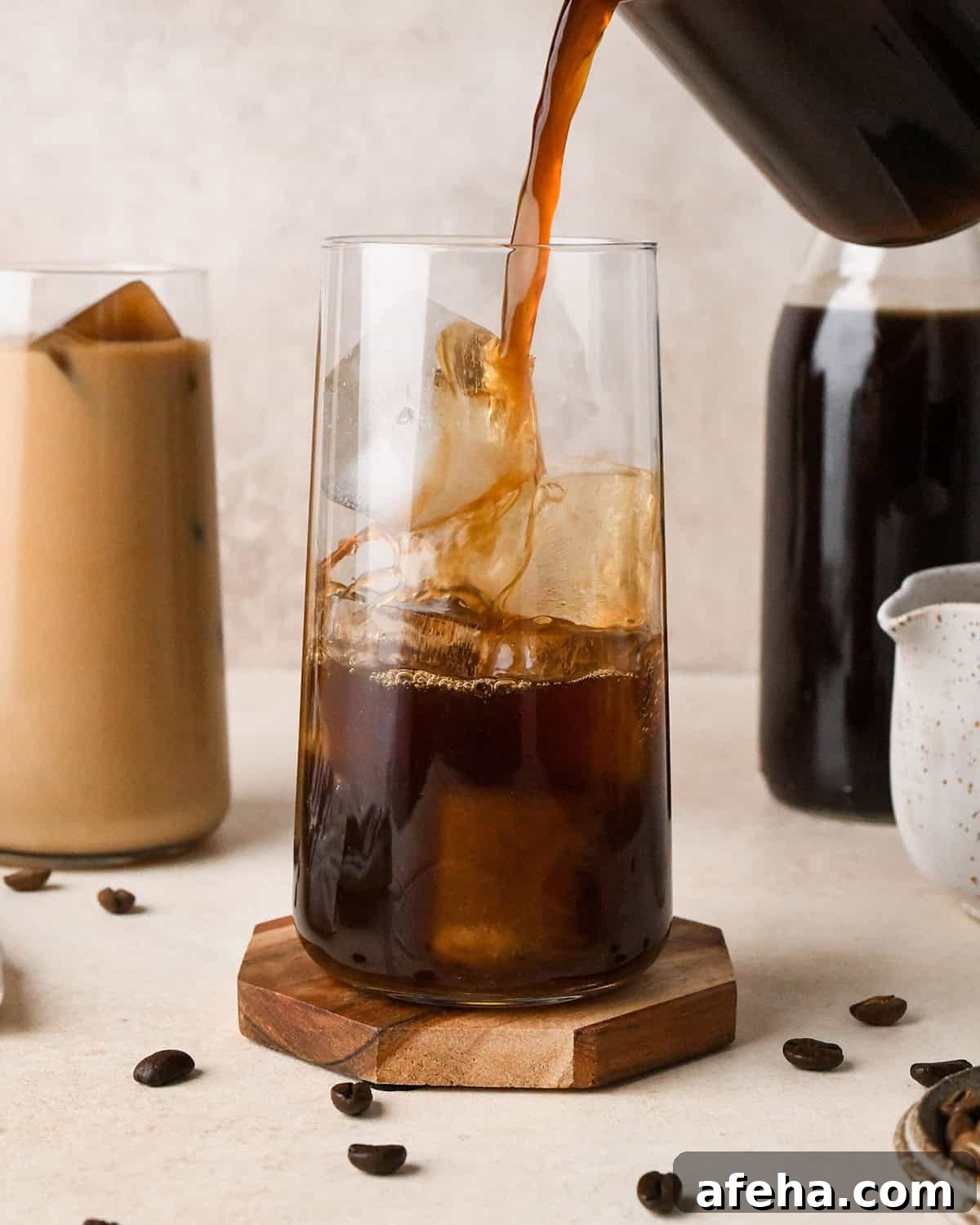 Cold Brew Coffee being poured into a glass with ice