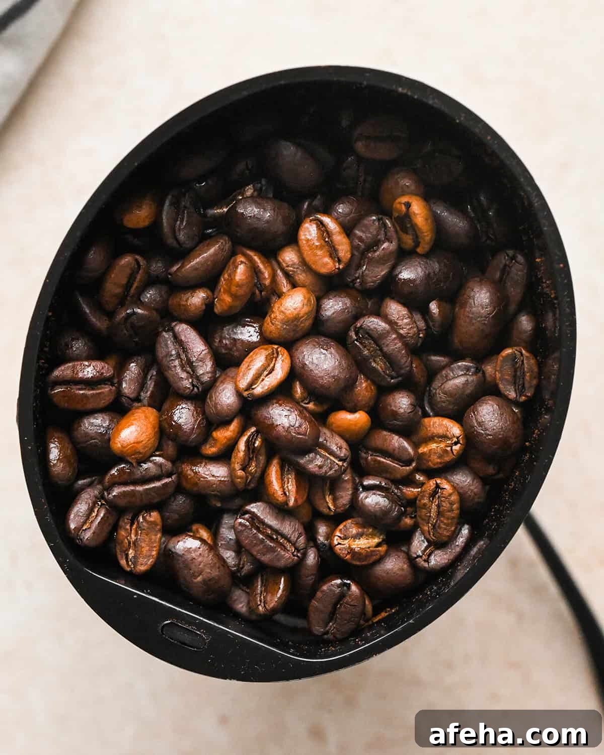 coffee beans in a grinder before grinding