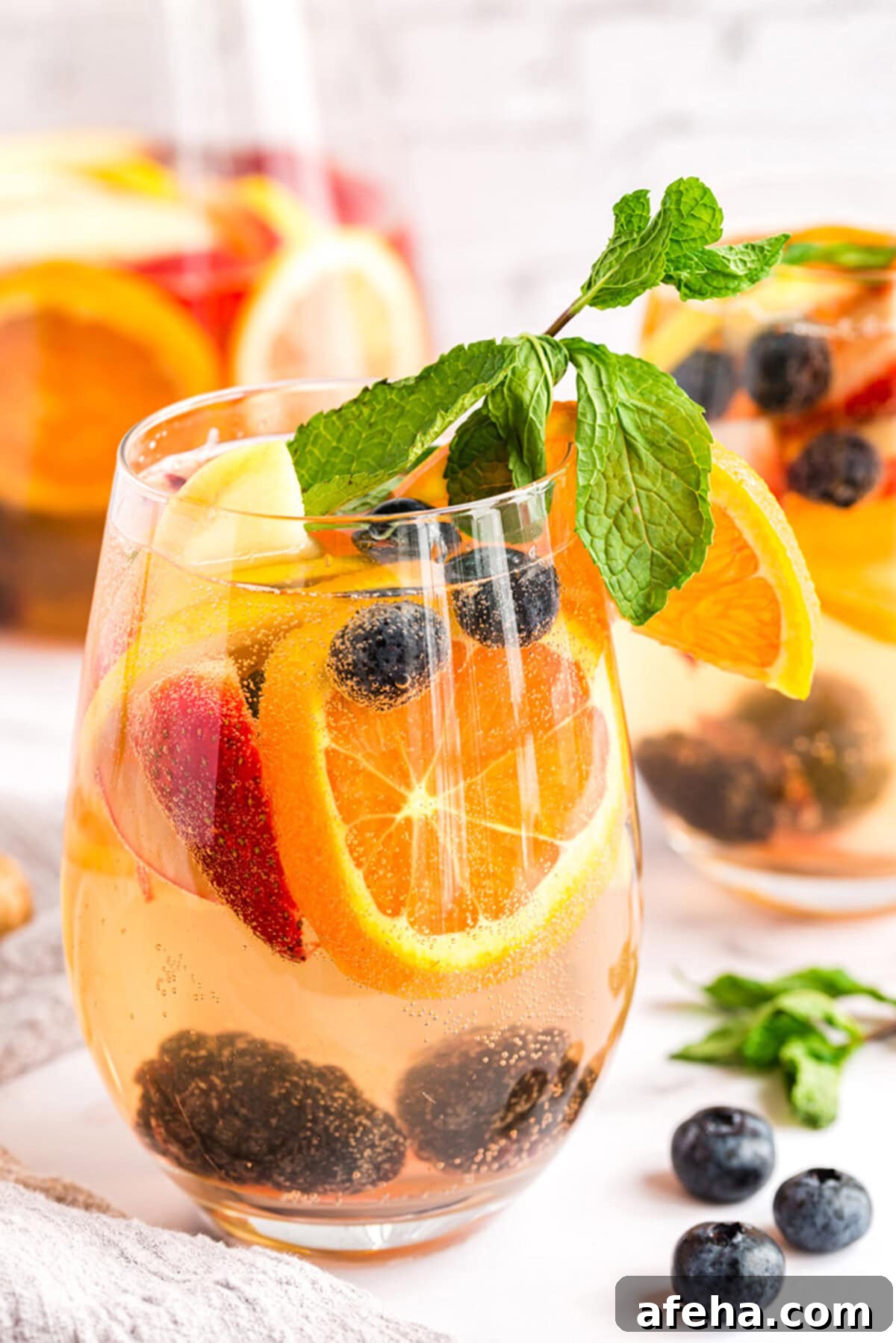 Close up photo of a glass of white moscato sangria
