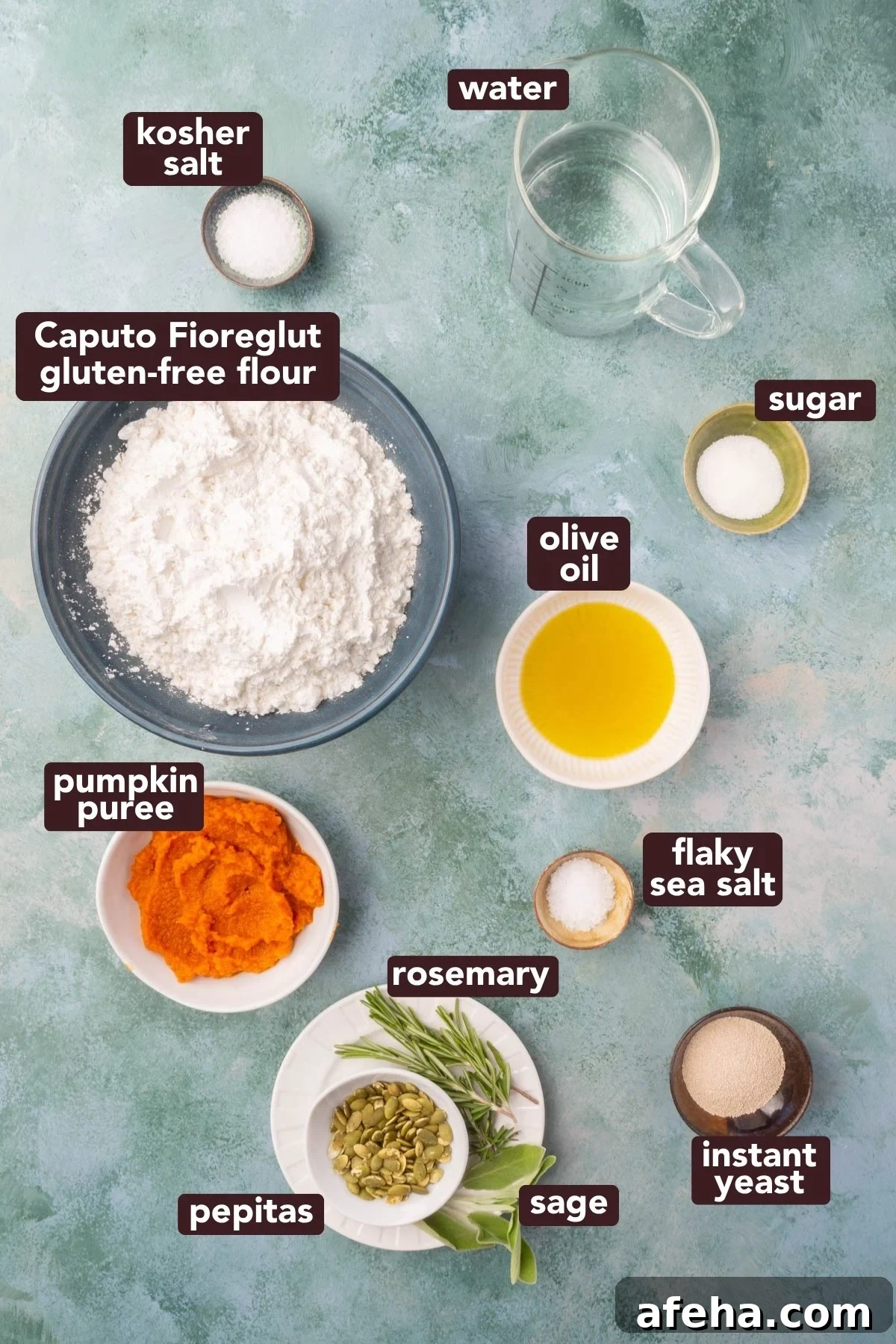 Flat lay of ingredients for gluten-free pumpkin focaccia including flour, pumpkin puree, olive oil, yeast, and herbs.