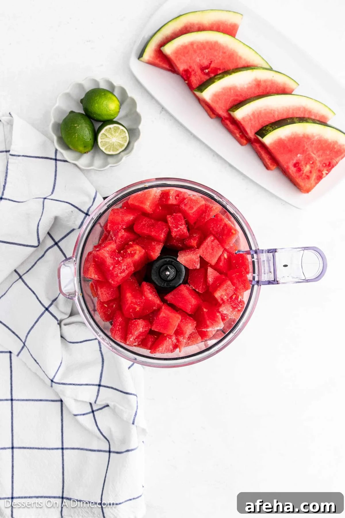 Watermelon cubes in food processor.