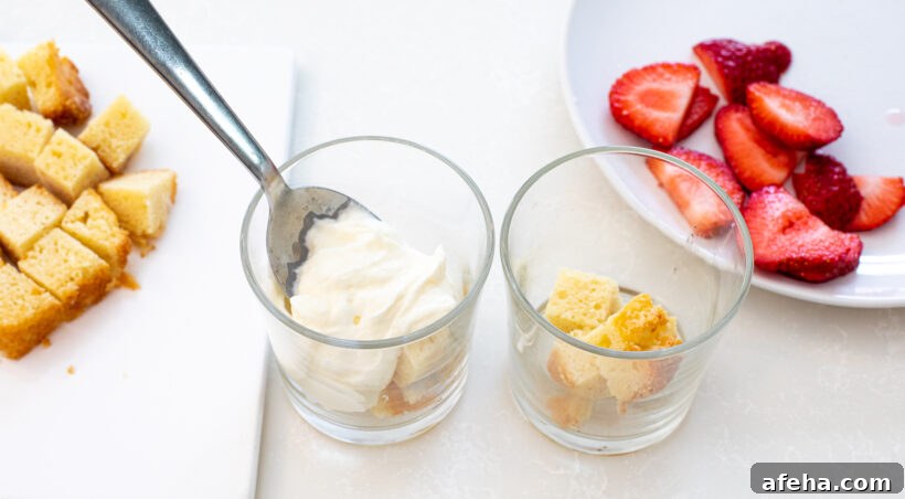 layering pound cake and whipped cream into jars