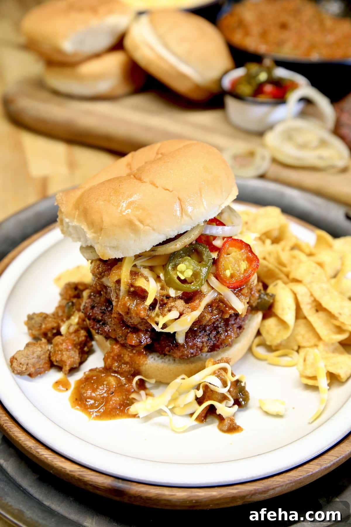 Burger with chili, cheese and jalapenos.