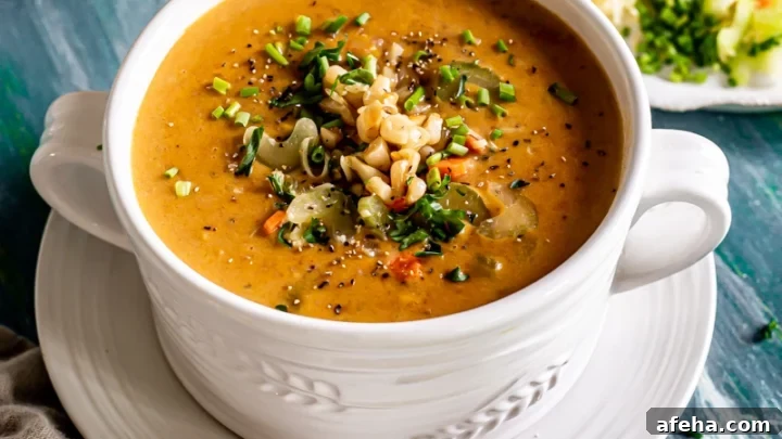 Smoked Paprika Corn Chowder in a white soup bowl.
