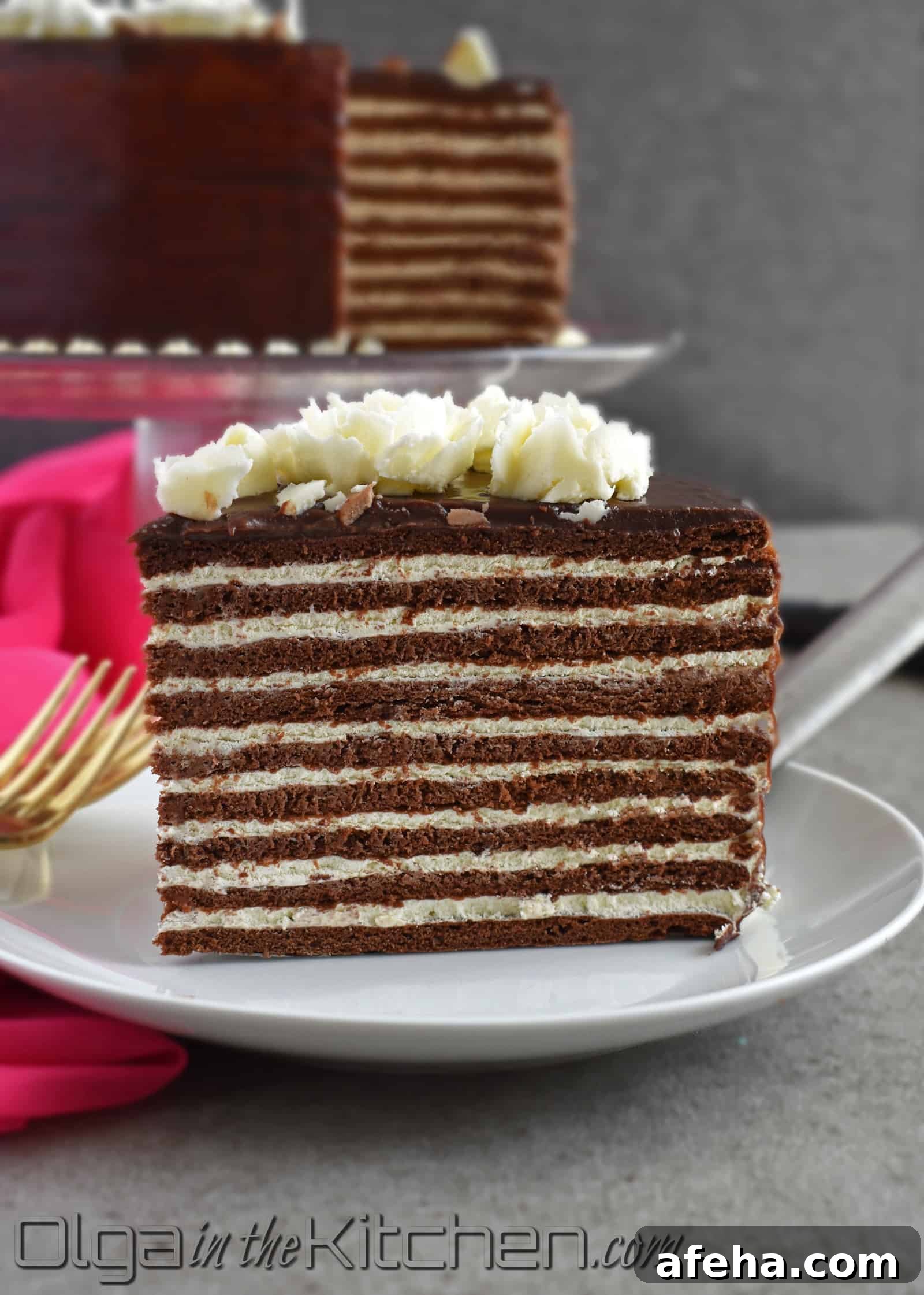Chocolate cake layers stacked and frosted