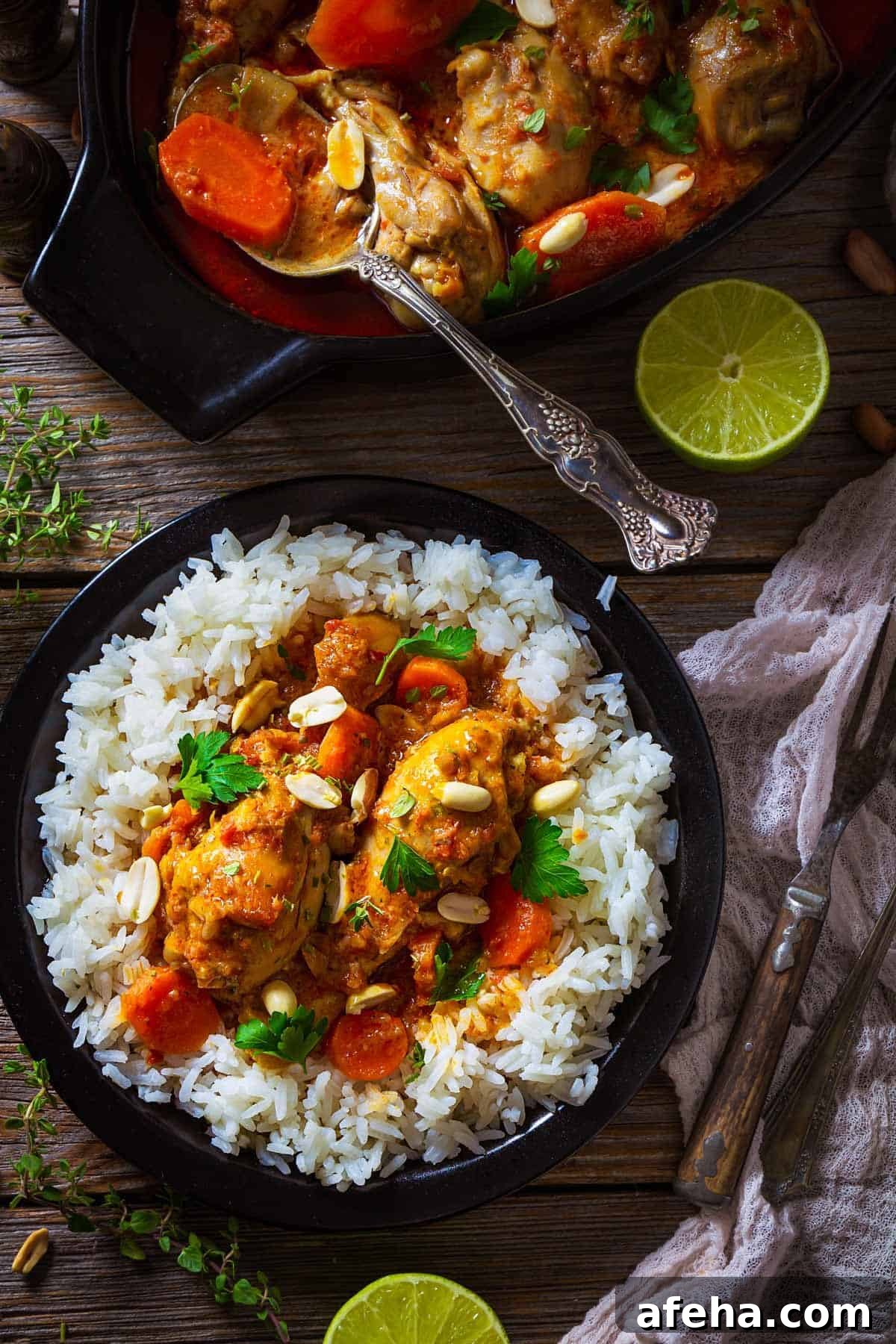 A plate with African spicy chicken peanut stew with peanuts and cilantro.