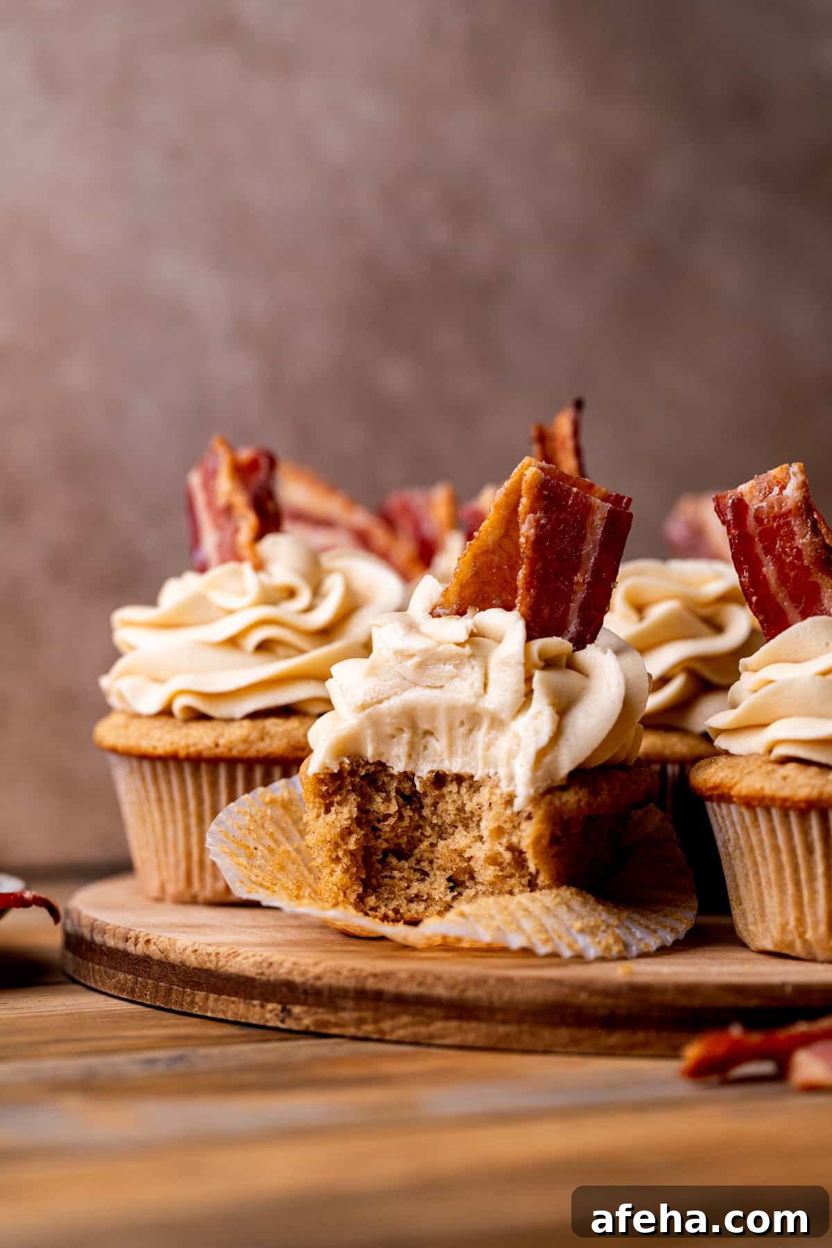 Cupcakes on a wood baord.
