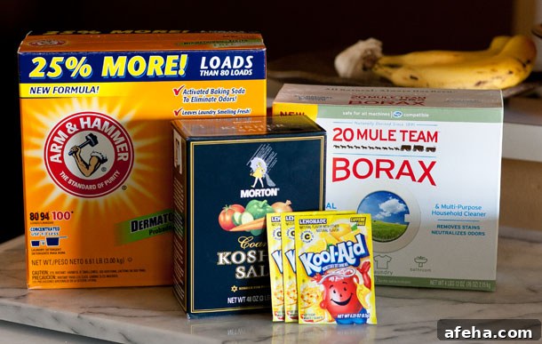 cleaning products on the counter in front of bananas.
