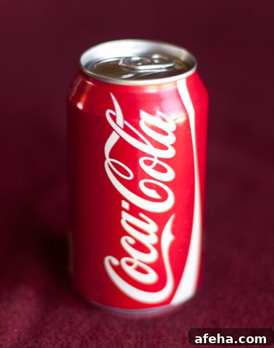 bottle of cola used as cleaner